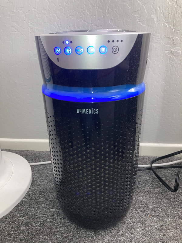 Image of Homedics UV air purifier used in office